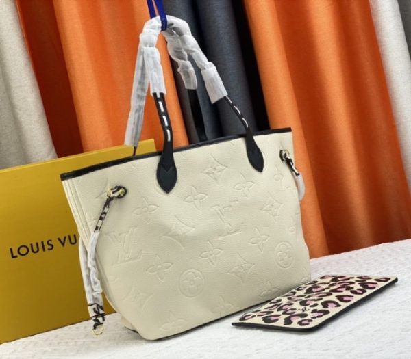 Replica Louis Vuitton Monogram Empreinte Wild At Heart Neverfull MM Tote In Cream - Image 2