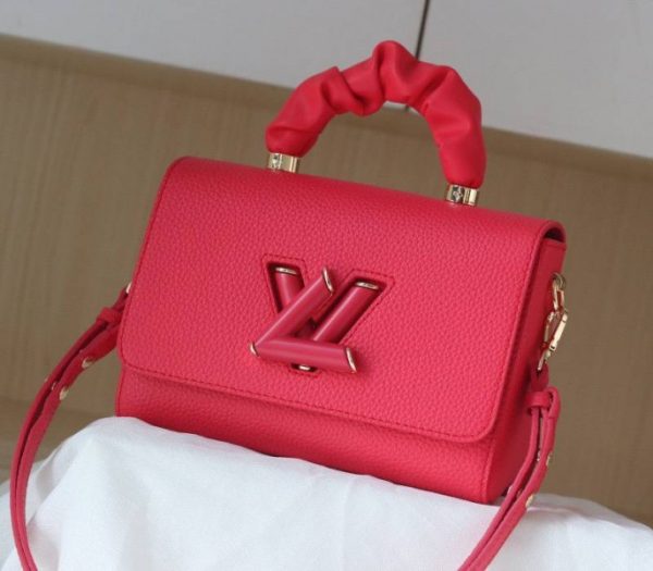 Replica Louis Vuitton Taurillon Leather Twist MM Scrunchie Handle In Pondichery Pink