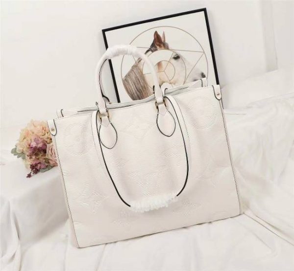 Replica Louis Vuitton Monogram Empreinte Giant Onthego GM Tote In Cream - Image 2