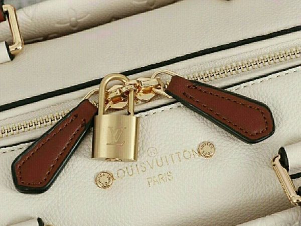 Replica Louis Vuitton Monogram Empreinte Speedy Bandouliere 25 Handbag In Cream - Image 6