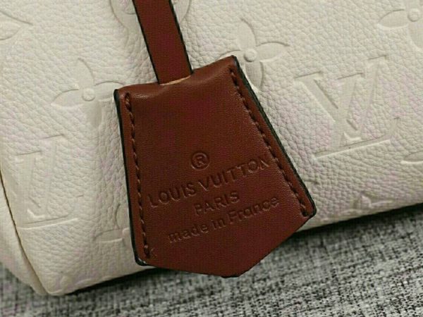 Replica Louis Vuitton Monogram Empreinte Speedy Bandouliere 25 Handbag In Cream - Image 9