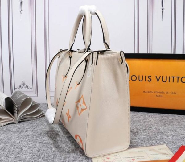 Replica Louis Vuitton Monogram Empreinte Leather Onthego MM Bag In Cream Saffron - Image 3