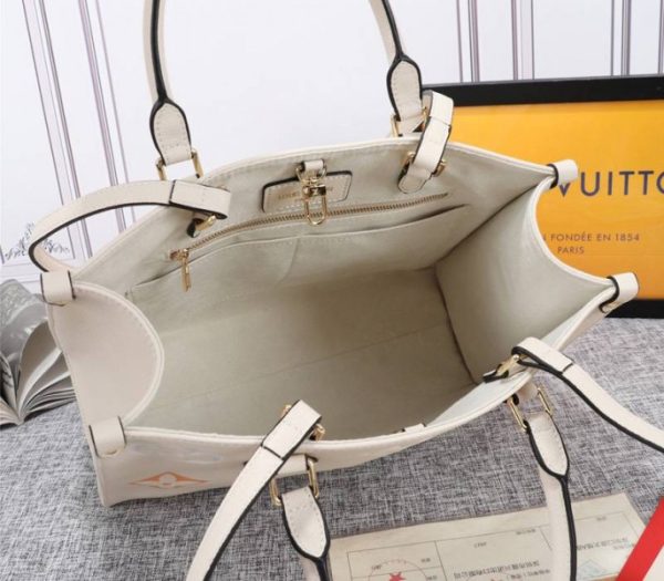 Replica Louis Vuitton Monogram Empreinte Leather Onthego MM Bag In Cream Saffron - Image 5