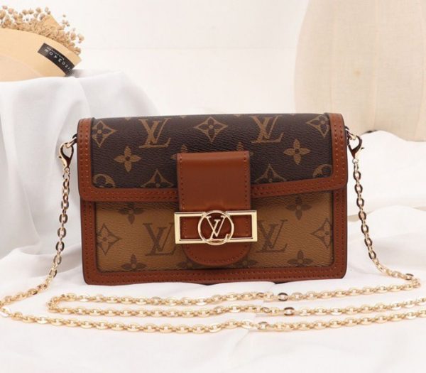 Replica Louis Vuitton Monogram Reverse Canvas Dauphine Chain Wallet