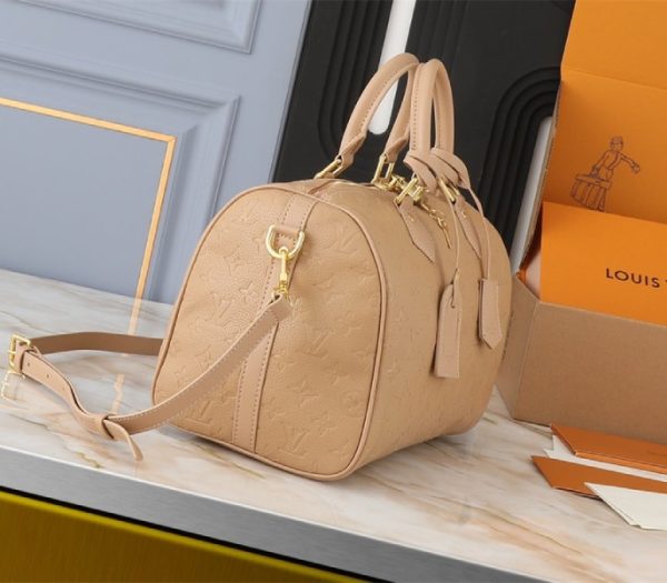 Replica Louis Vuitton Monogram Empreinte Speedy Soft 30 Handbag In Apricot - Image 4