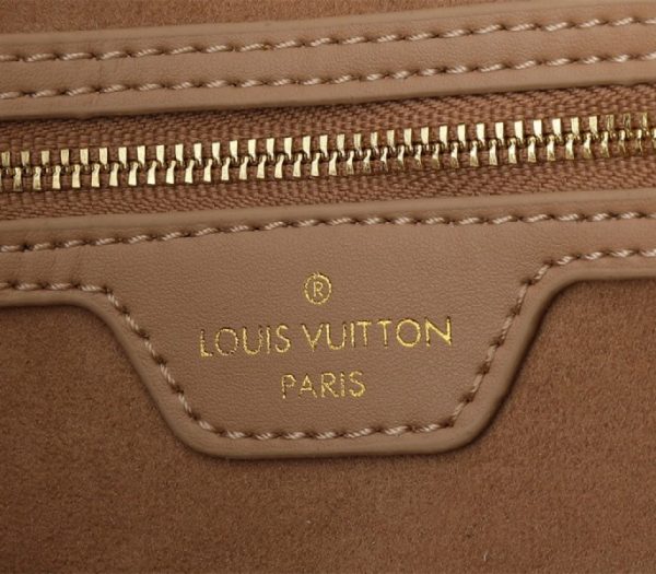 Replica Louis Vuitton Monogram Empreinte Speedy Soft 30 Handbag In Apricot - Image 9