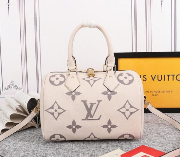 Replica Louis Vuitton Bicolor Monogram Empreinte Leather Speedy Bandouliere 25 Handbag In Cream And Bois De Rose Pink