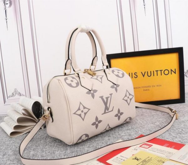 Replica Louis Vuitton Bicolor Monogram Empreinte Leather Speedy Bandouliere 25 Handbag In Cream And Bois De Rose Pink - Image 2