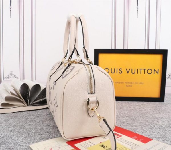 Replica Louis Vuitton Bicolor Monogram Empreinte Leather Speedy Bandouliere 25 Handbag In Cream And Bois De Rose Pink - Image 3