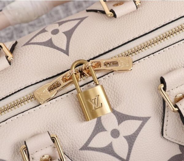 Replica Louis Vuitton Bicolor Monogram Empreinte Leather Speedy Bandouliere 25 Handbag In Cream And Bois De Rose Pink - Image 8