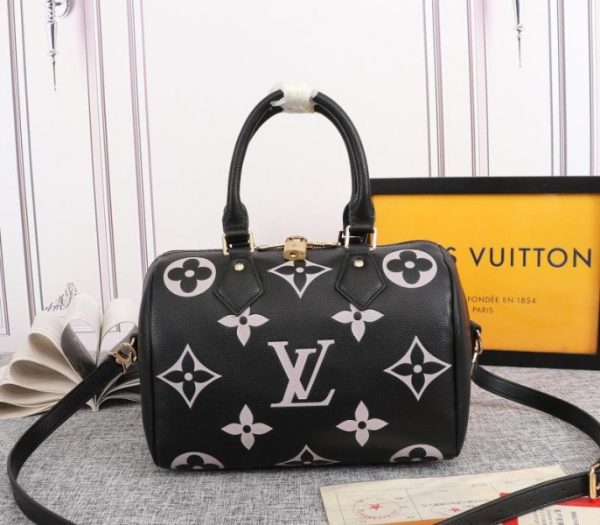 Replica Louis Vuitton Bicolor Monogram Empreinte Leather Speedy Bandouliere 25 Handbag In Black And Lilac