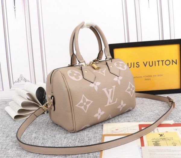 Replica Louis Vuitton Bicolor Monogram Empreinte Leather Speedy Bandouliere 25 Handbag In Tourterelle Gray And Cream - Image 2