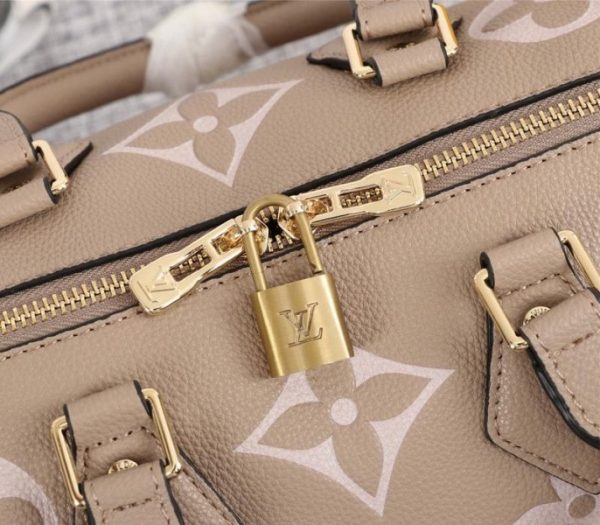 Replica Louis Vuitton Bicolor Monogram Empreinte Leather Speedy Bandouliere 25 Handbag In Tourterelle Gray And Cream - Image 8