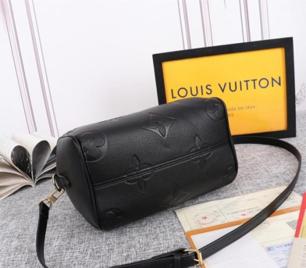 Replica Louis Vuitton Monogram Empreinte Leather Speedy Bandouliere 25 Handbag In Black - Image 4