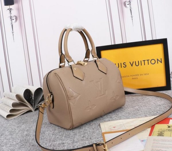 Replica Louis Vuitton Monogram Empreinte Leather Speedy Bandouliere 25 Handbag In Tourterelle Gray - Image 2