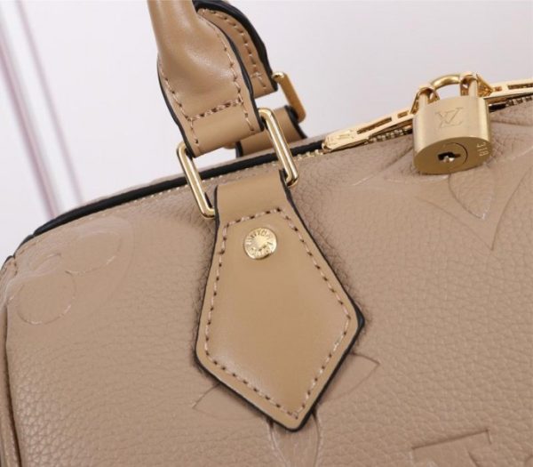 Replica Louis Vuitton Monogram Empreinte Leather Speedy Bandouliere 25 Handbag In Tourterelle Gray - Image 7