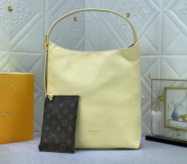 Replica Louis Vuitton Low Key MM Hobo In Urban Yellow