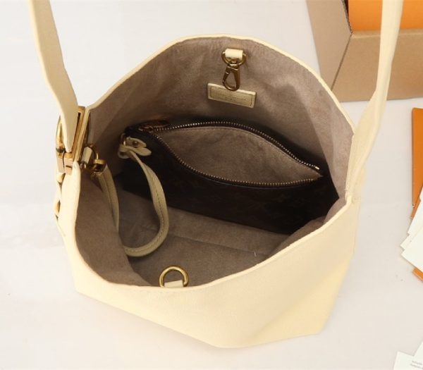 Replica Louis Vuitton Low Key PM Hobo In Urban Yellow - Image 3