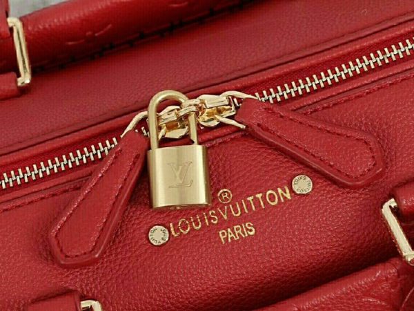 Replica Louis Vuitton Monogram Empreinte Speedy Bandouliere 25 Handbag In Red - Image 6