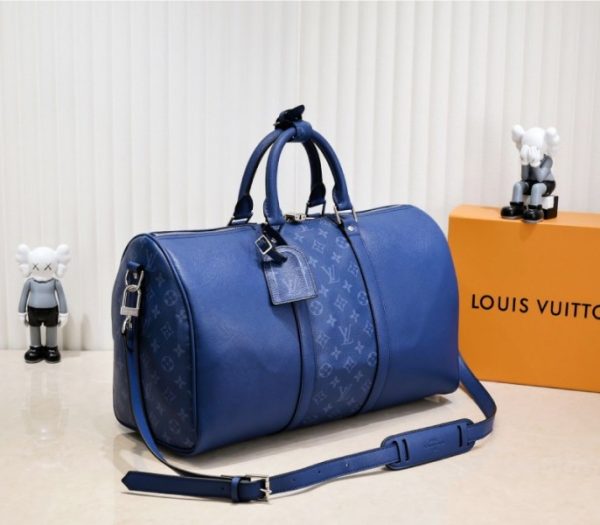 Replica Louis Vuitton Taiga Leather Keepall Bandouliere 50 Travel Bag In Navy Blue - Image 2