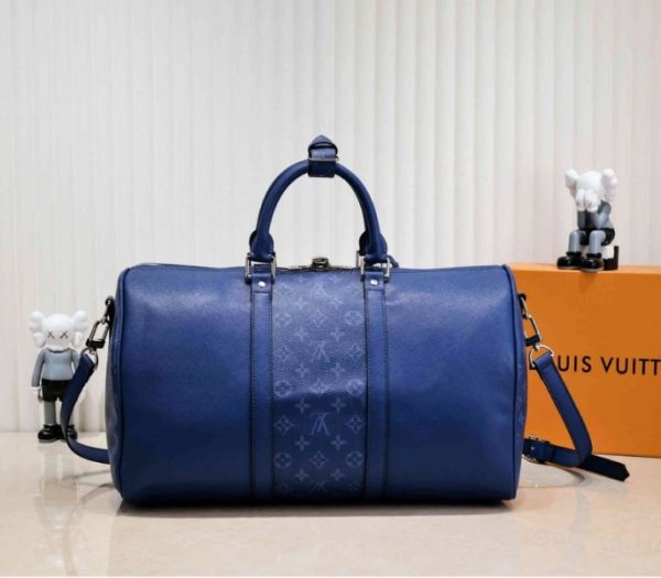 Replica Louis Vuitton Taiga Leather Keepall Bandouliere 50 Travel Bag In Navy Blue - Image 3