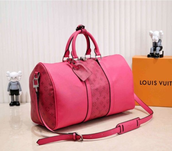 Replica Louis Vuitton Taiga Leather Keepall Bandouliere 50 Travel Bag In Pink - Image 2