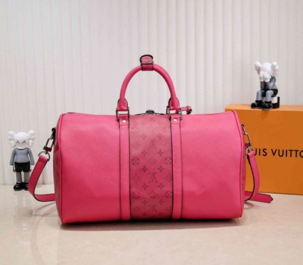 Replica Louis Vuitton Taiga Leather Keepall Bandouliere 50 Travel Bag In Pink - Image 3