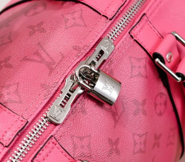 Replica Louis Vuitton Taiga Leather Keepall Bandouliere 50 Travel Bag In Pink - Image 7