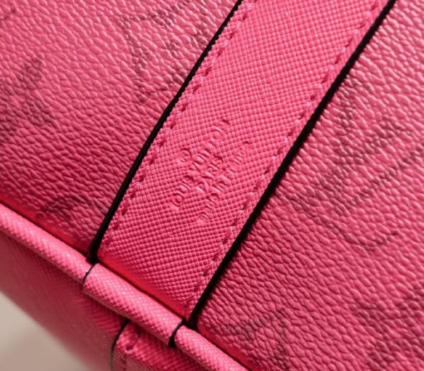 Replica Louis Vuitton Taiga Leather Keepall Bandouliere 50 Travel Bag In Pink - Image 9