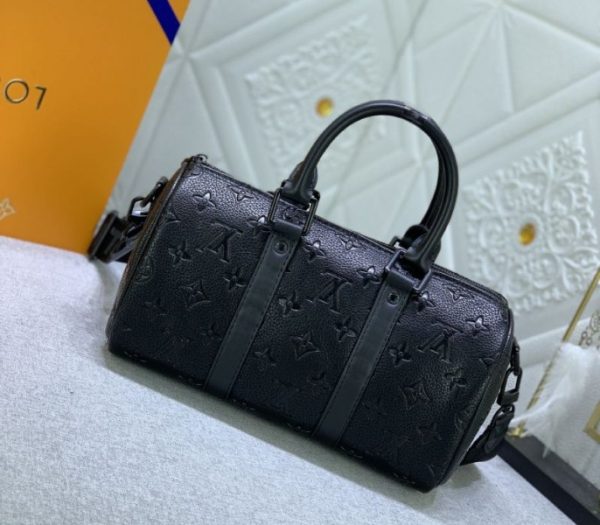 Replica Louis Vuitton Taurillon Monogram Leather Keepall Bandouliere 25 In Black - Image 3